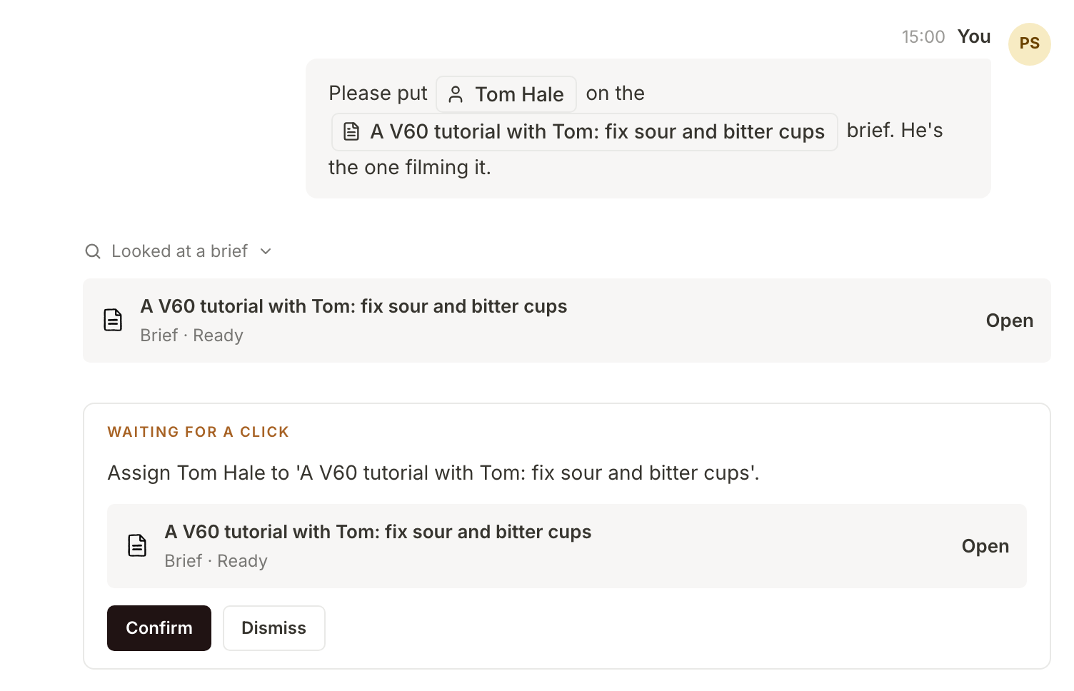 Priya asks the manager to put Tom on the V60 tutorial brief; it comes back as a card waiting for a click, with Confirm and Dismiss